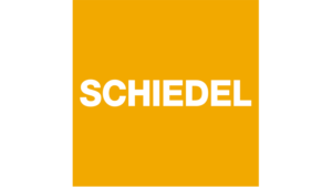 Vit text "SCHIEDEL" på en orange bakgrund.