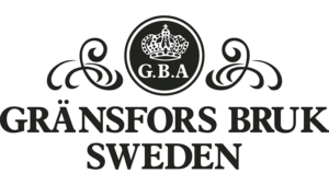 Gränsfors Bruk Sweden logotyp med dekorativa element och texten "G.B.A" under en krona.